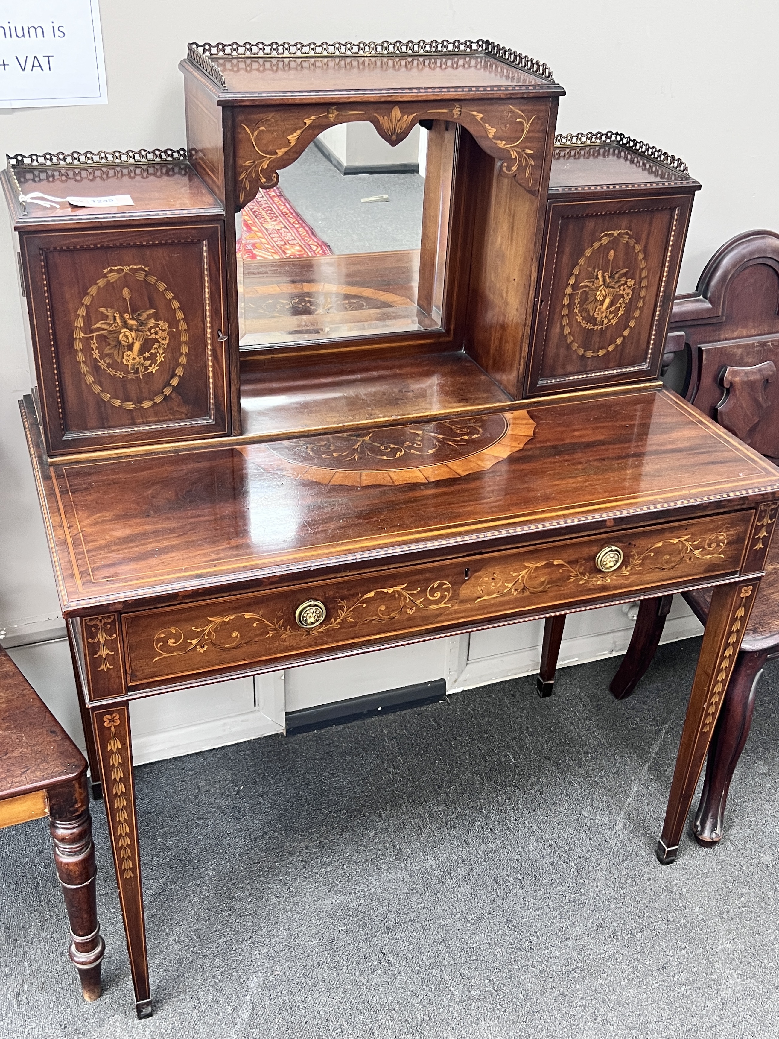 An Edwardian marquetry inlaid mahogany bonheur du jour, in the manner of Edwards & Roberts, width 92cm, depth 52cm, height 118cm